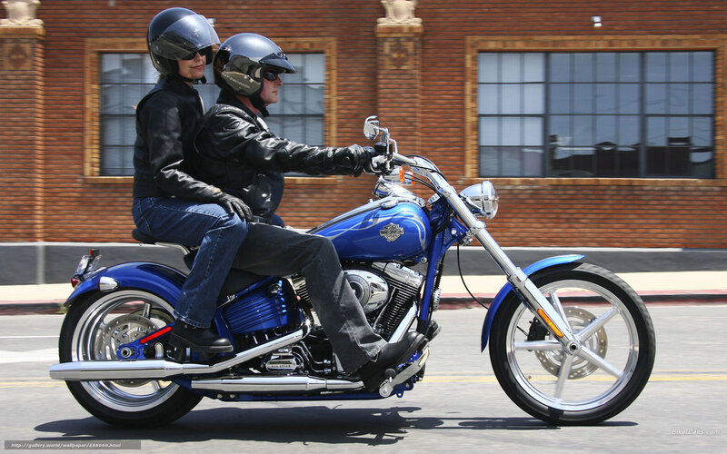 Couple on Blue Motorcycle — Calm