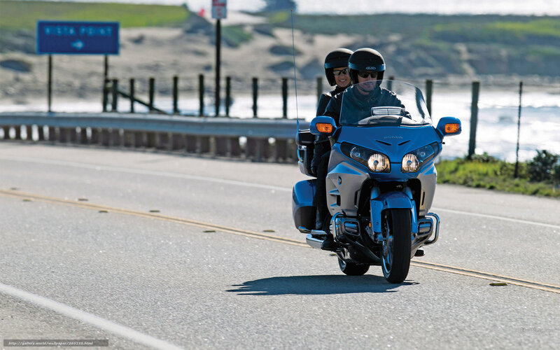 Couple on Blue Motorcycle — Serene