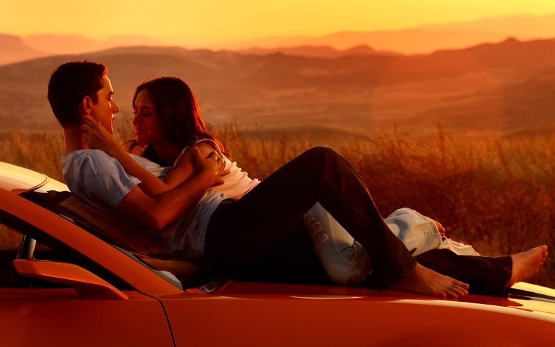 Couple on Car Hood
