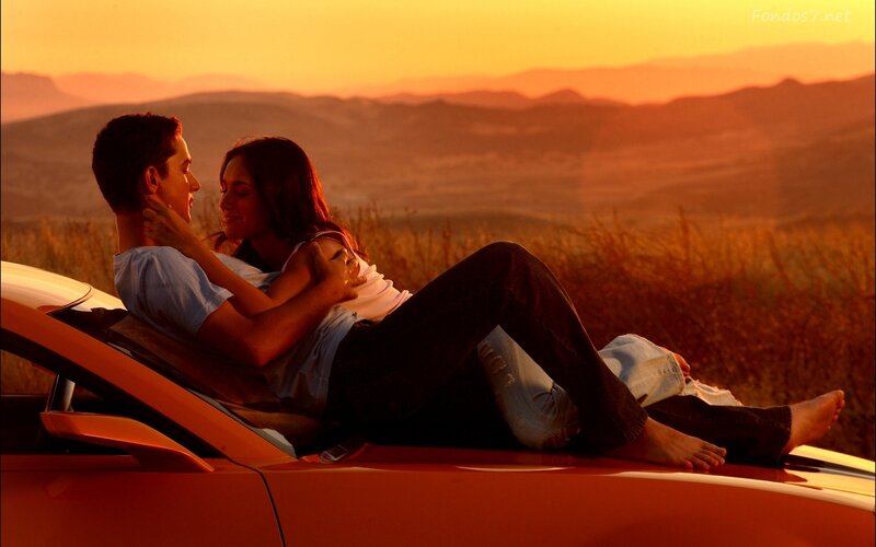 Couple on Car Roof