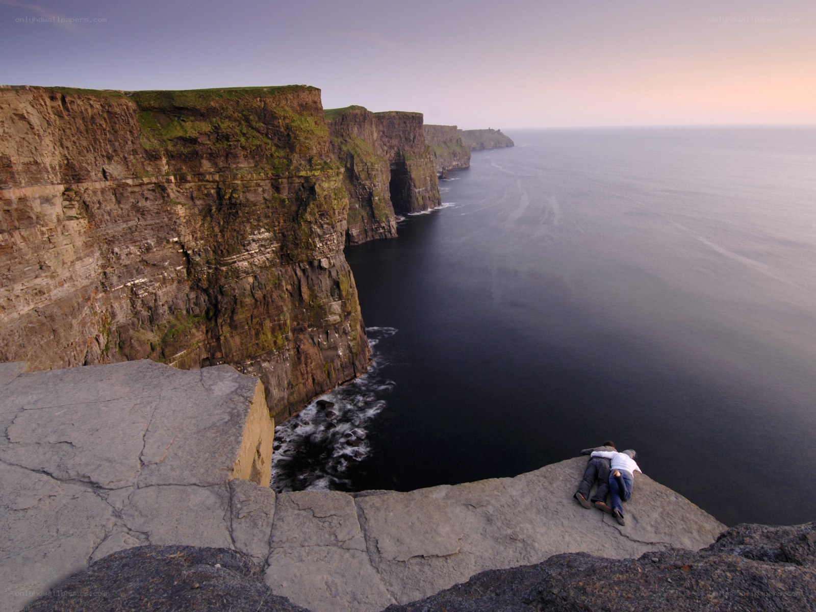 Couple on Cliffs Edge