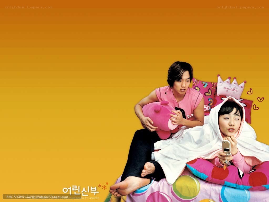 couple on colorful bed