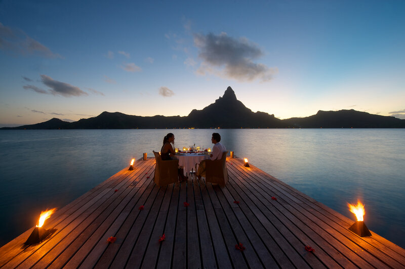 Couple on Dock at Sunset