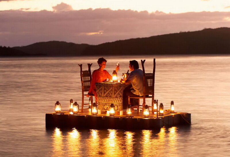Couple on Floating Dinner Table — Orange