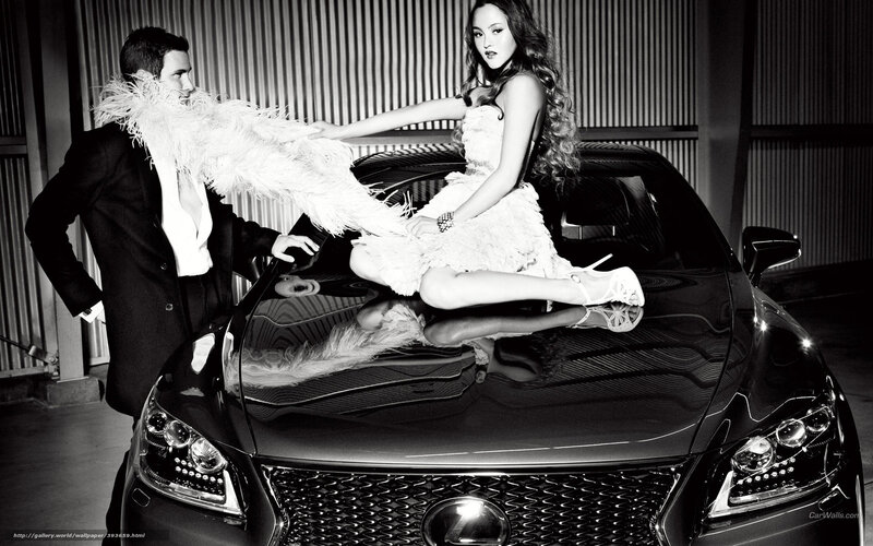 Couple on luxury car hood