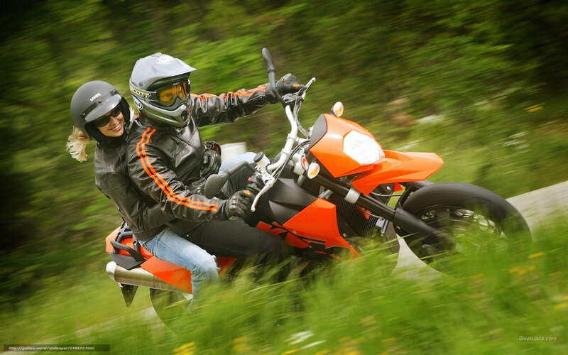 Couple on Orange Motorcycle — Dynamic
