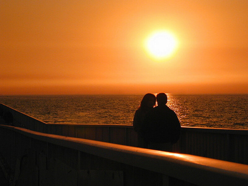 Couple on Pier at Sunset — Orange