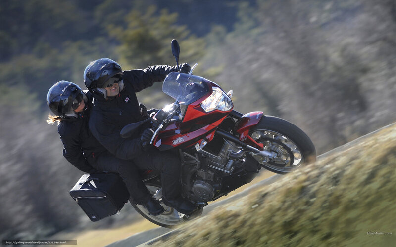 Couple on Red Motorcycle — Dynamic, Afternoon, Photograph