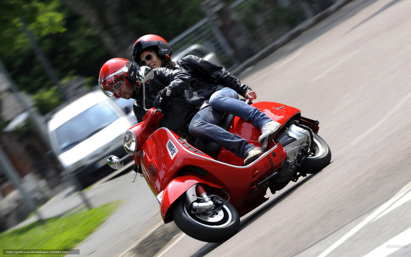 Couple on Red Scooter — Dynamic, Afternoon, Photograph