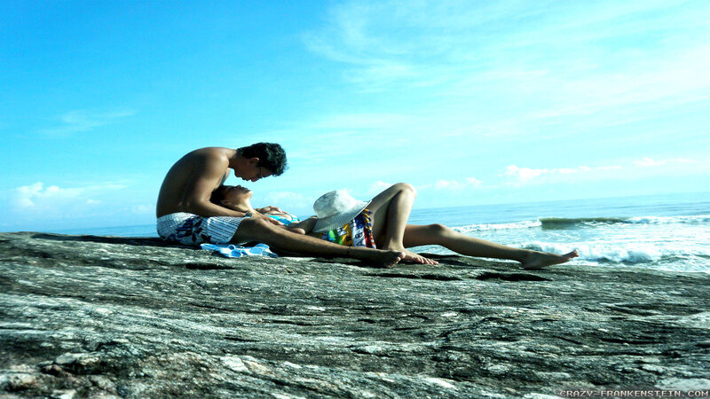 Couple on Rocky Beach — Blue