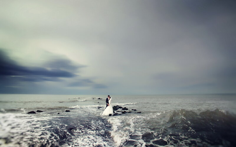 Couple on Rocky Shore — Gray