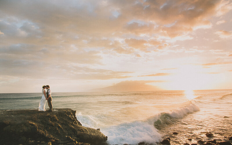 Couple on Rocky Shore — Orange, Serene