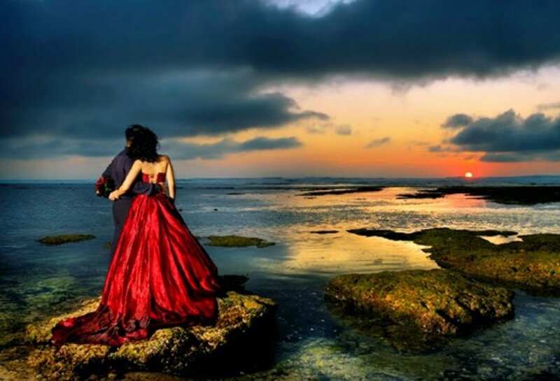 Couple on Rocky Shore — Red