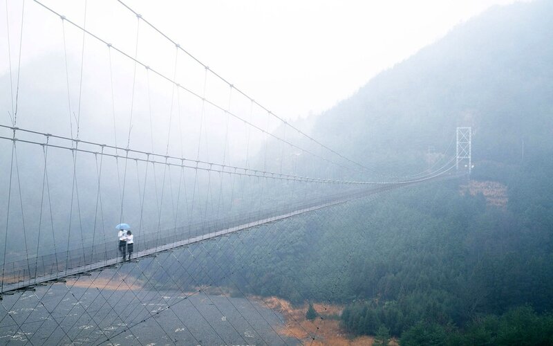 Couple on Suspension Bridge
