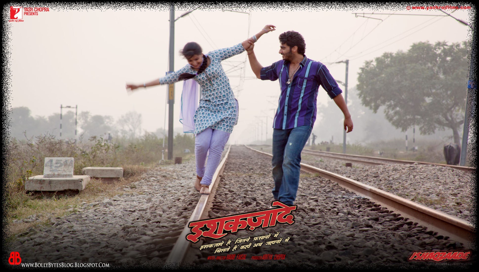 couple on train tracks