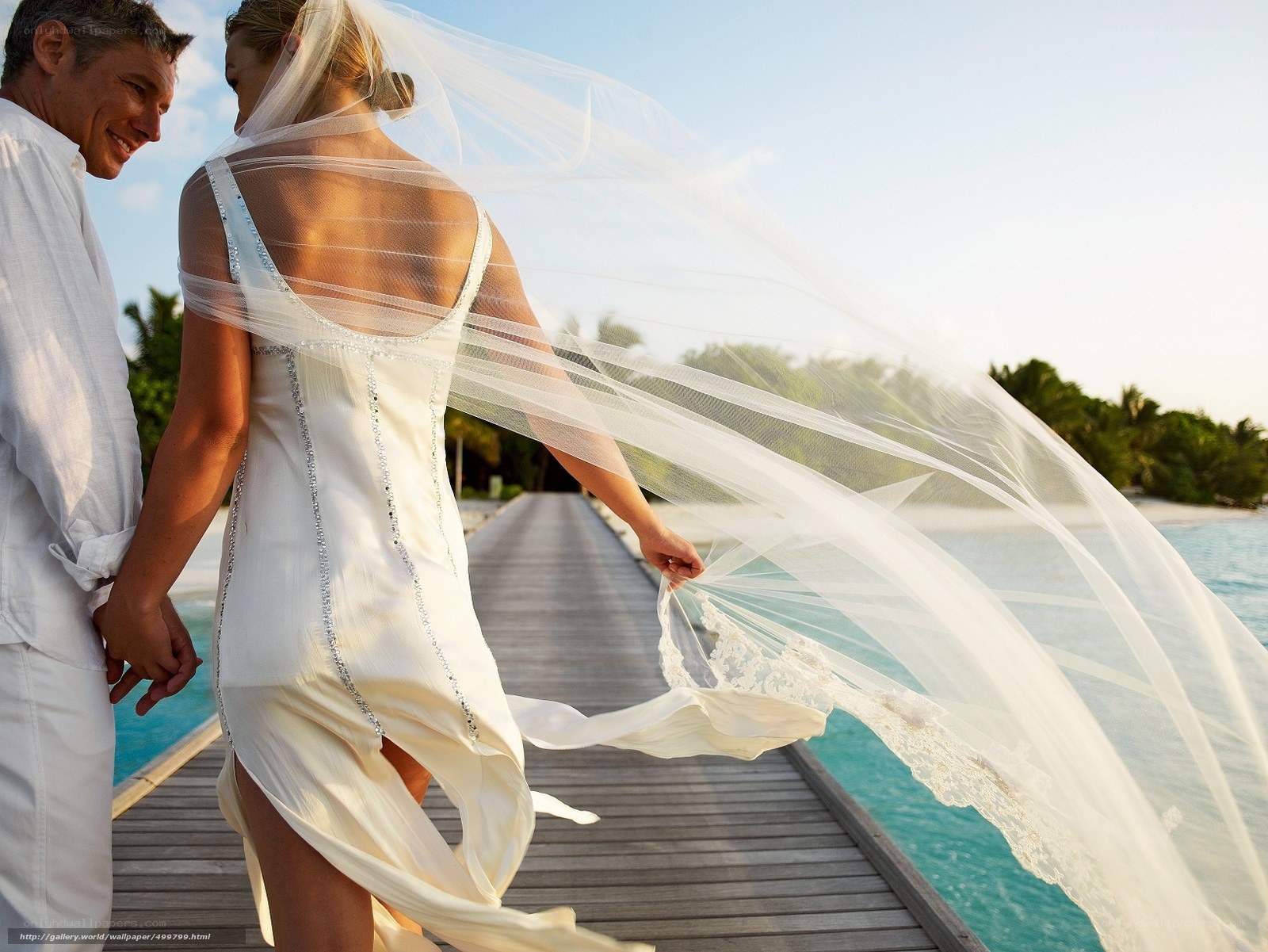 Couple on wedding day at beach