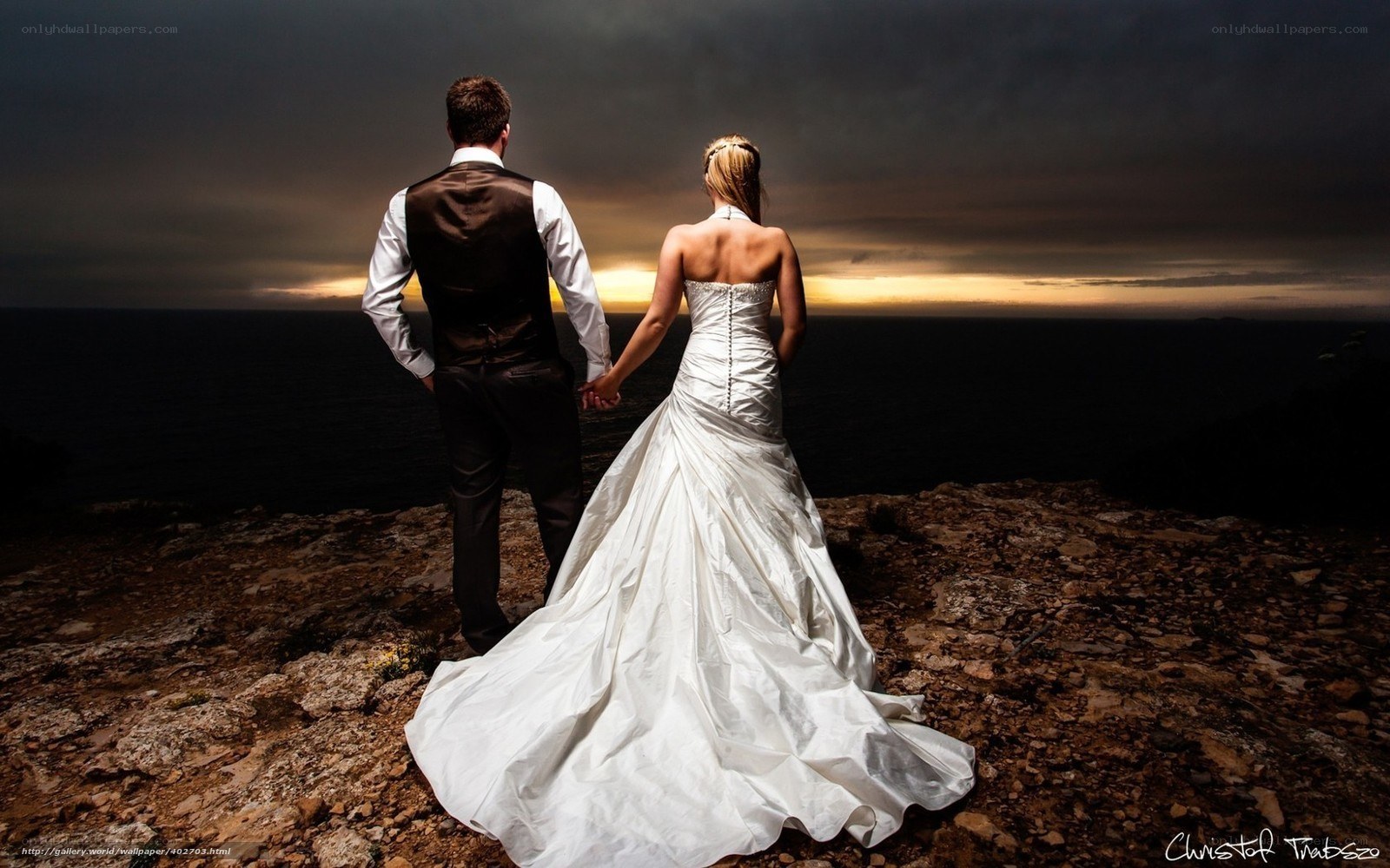 Couple on wedding day at sunset