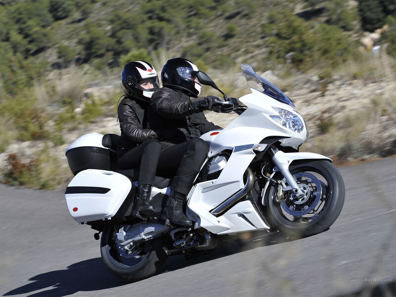 Couple on White Motorcycle — Active