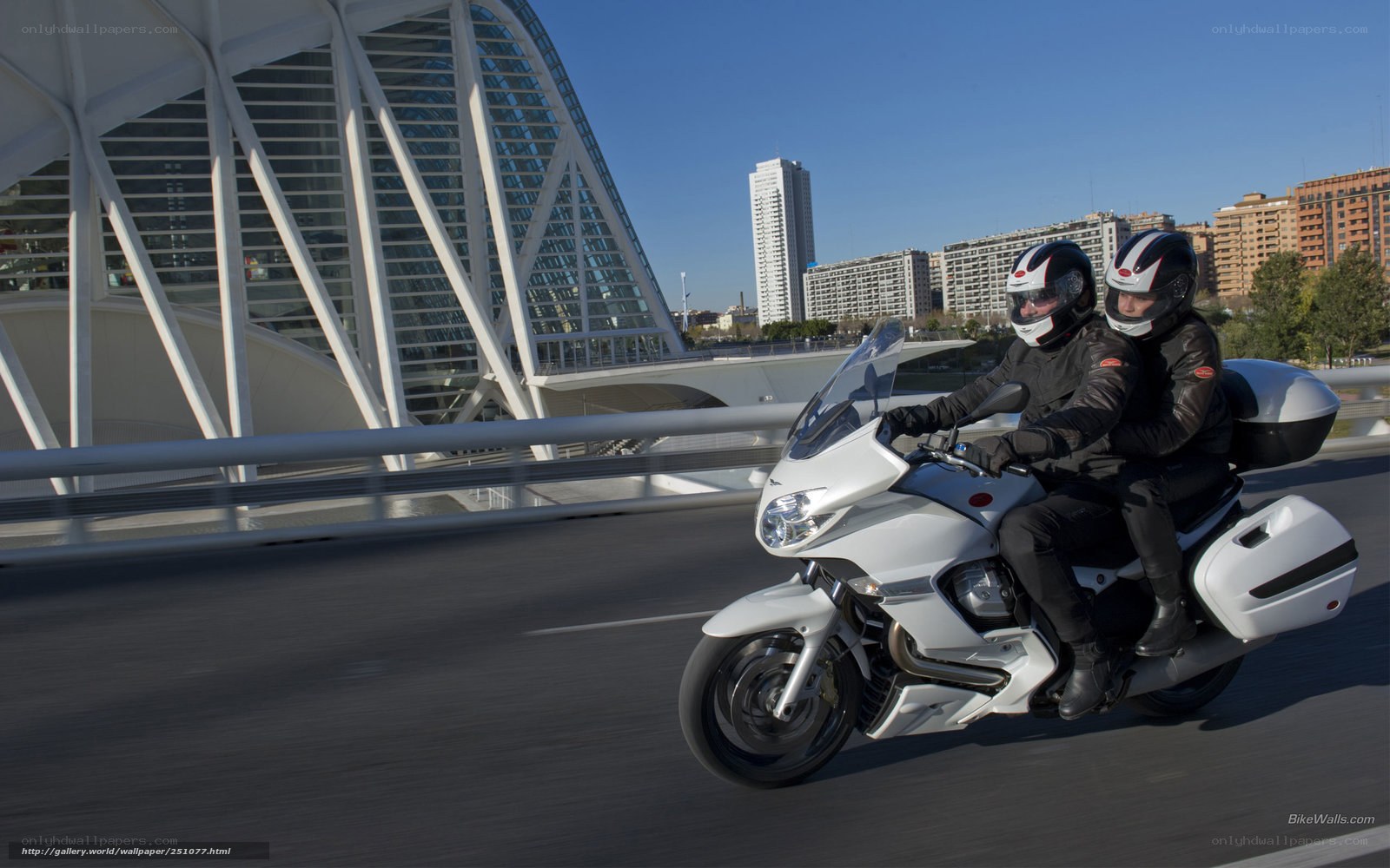 Couple on white motorcycle