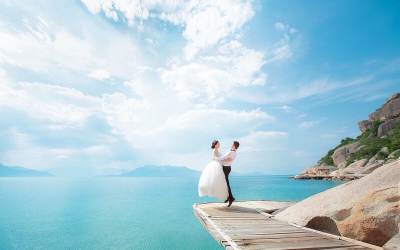 Couple on Wooden Pier — Blue