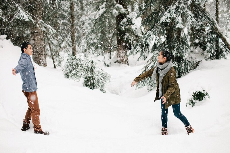 Couple playing in snow
