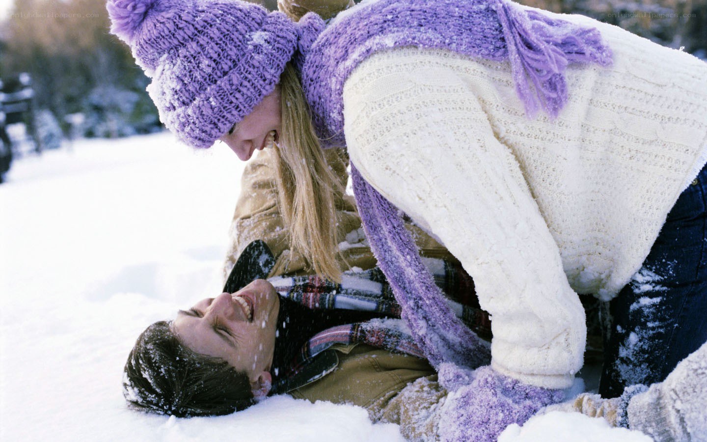 Couple playing in the snow