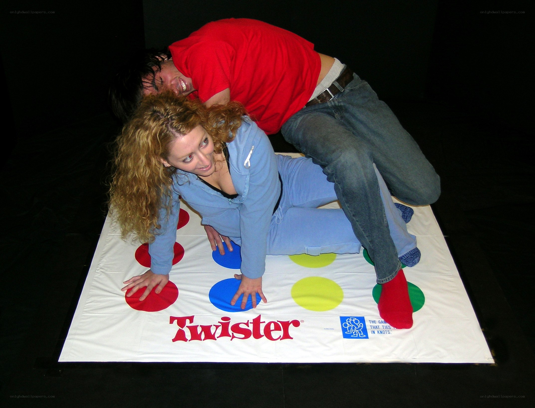 Couple playing Twister game