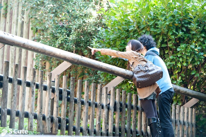 Couple pointing at something