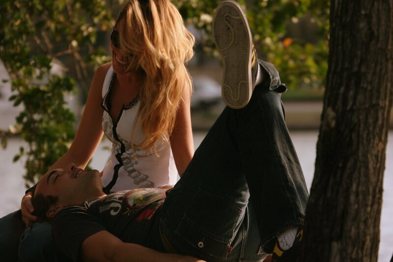 Couple relaxing in park
