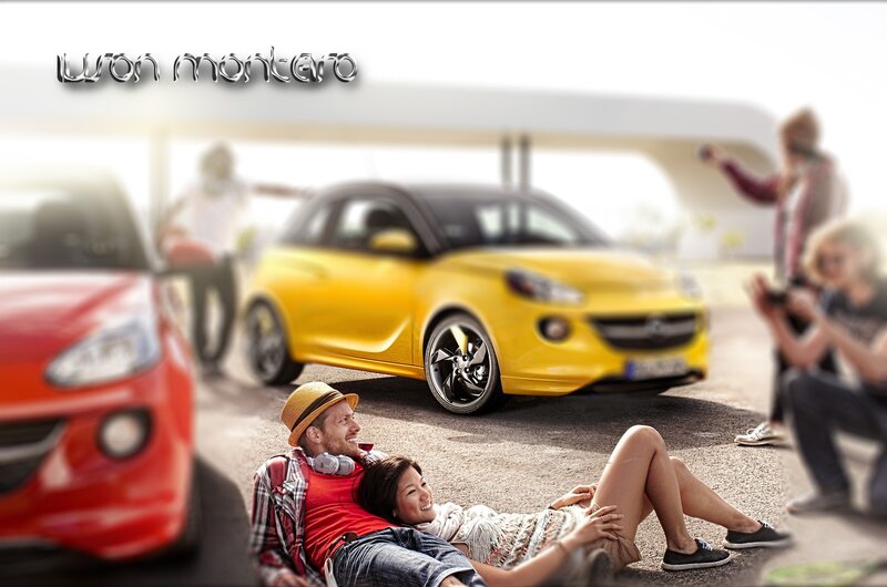 Couple relaxing near cars