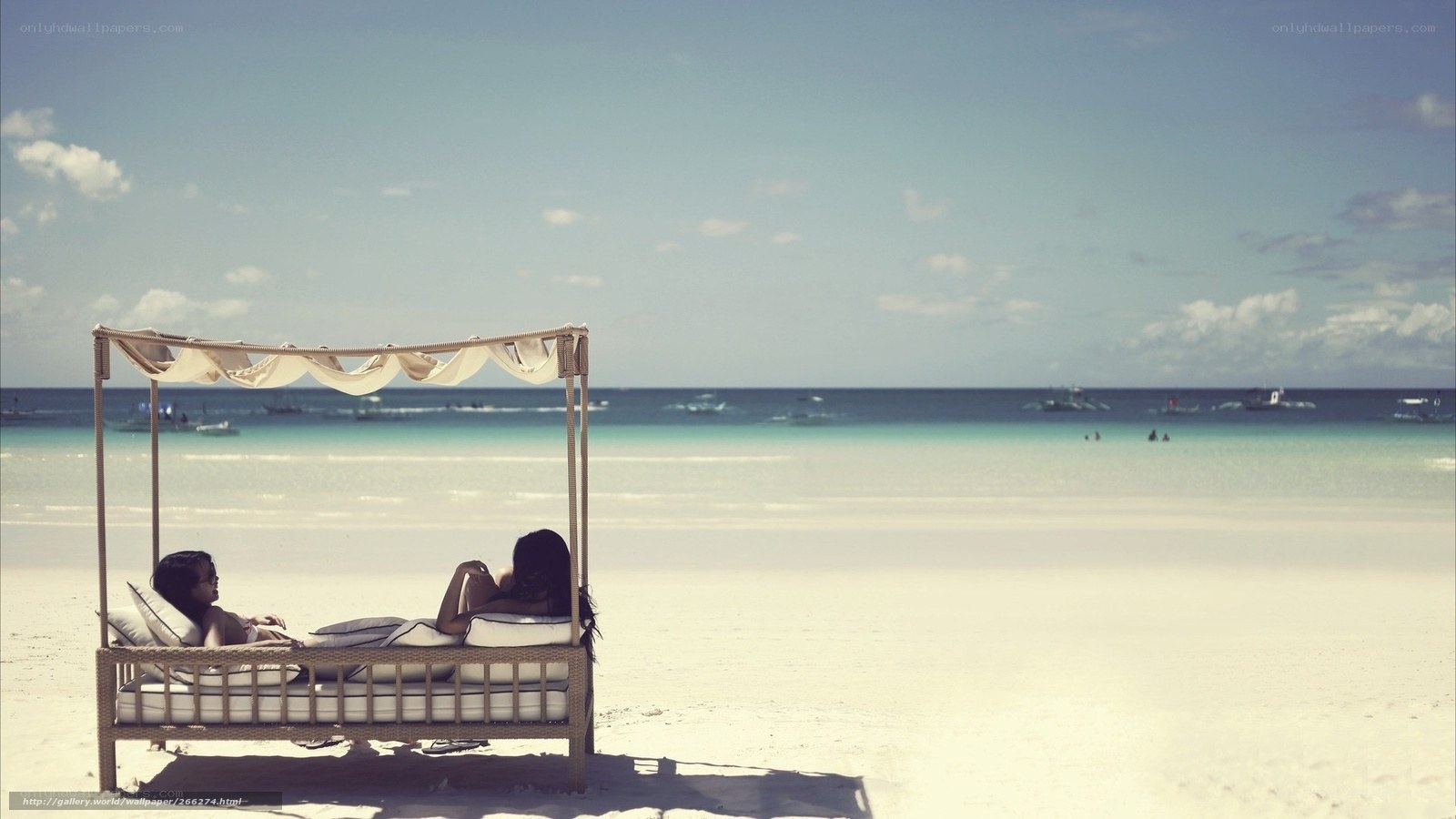 Couple relaxing on beach
