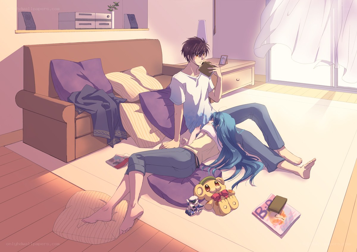 Couple relaxing on floor