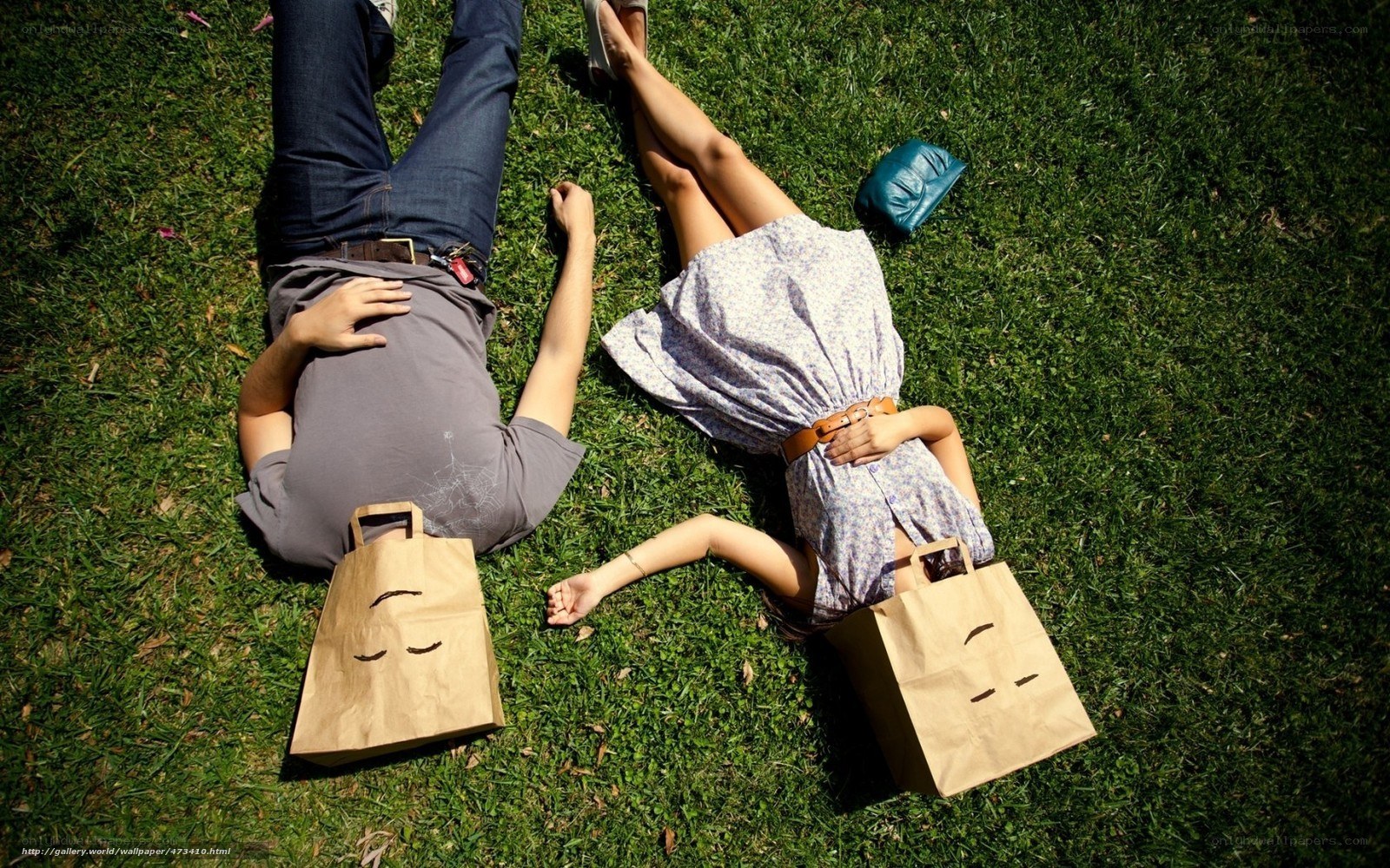 Couple relaxing on grass