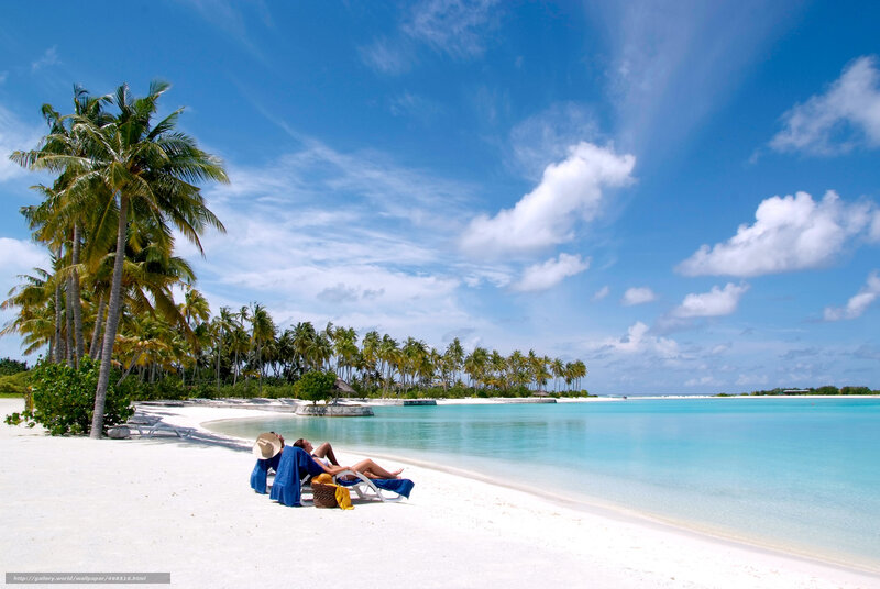 Couple relaxing on tropical beach