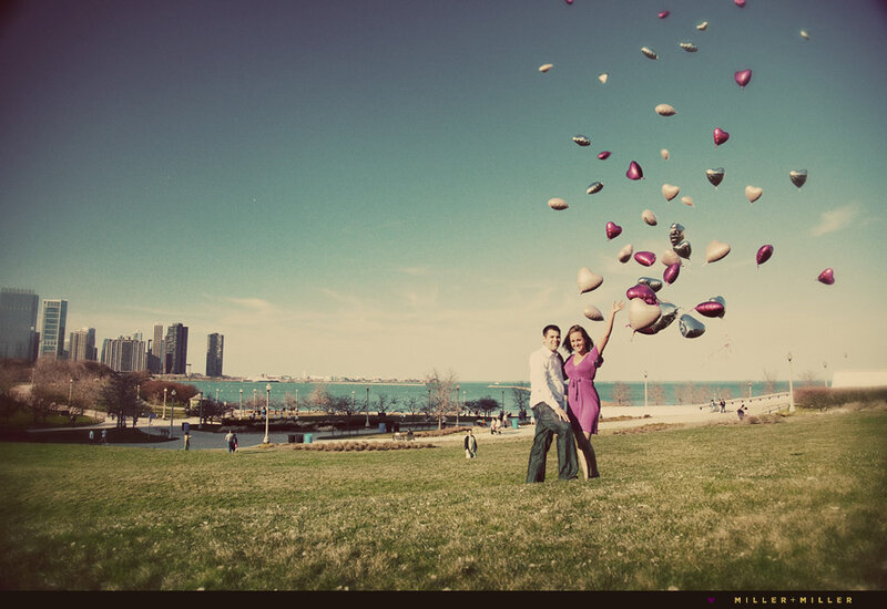 Couple Releasing Balloons