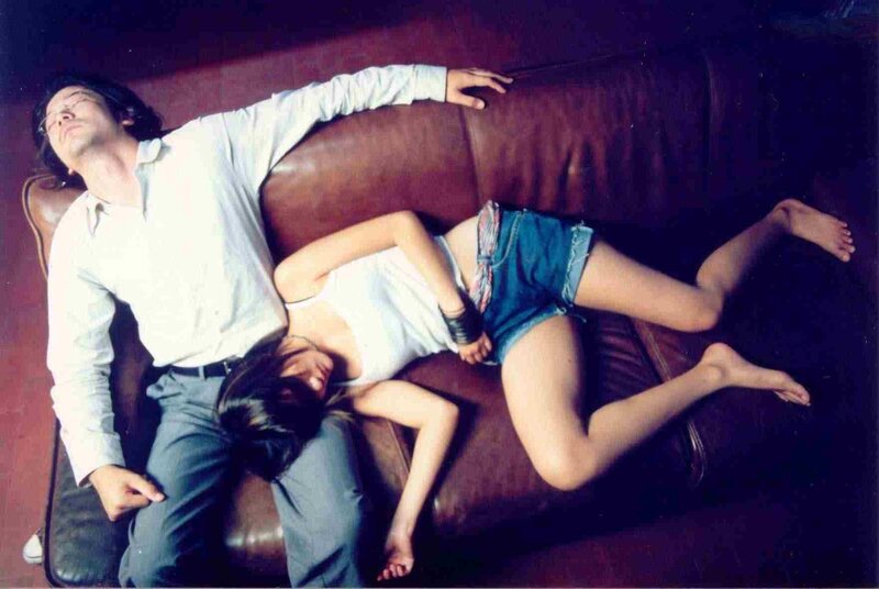 Couple resting on a couch