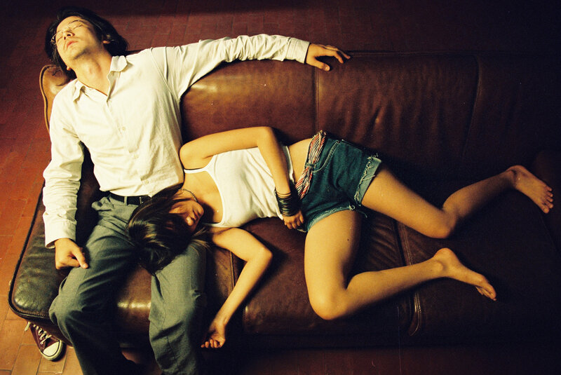 Couple resting on a couch