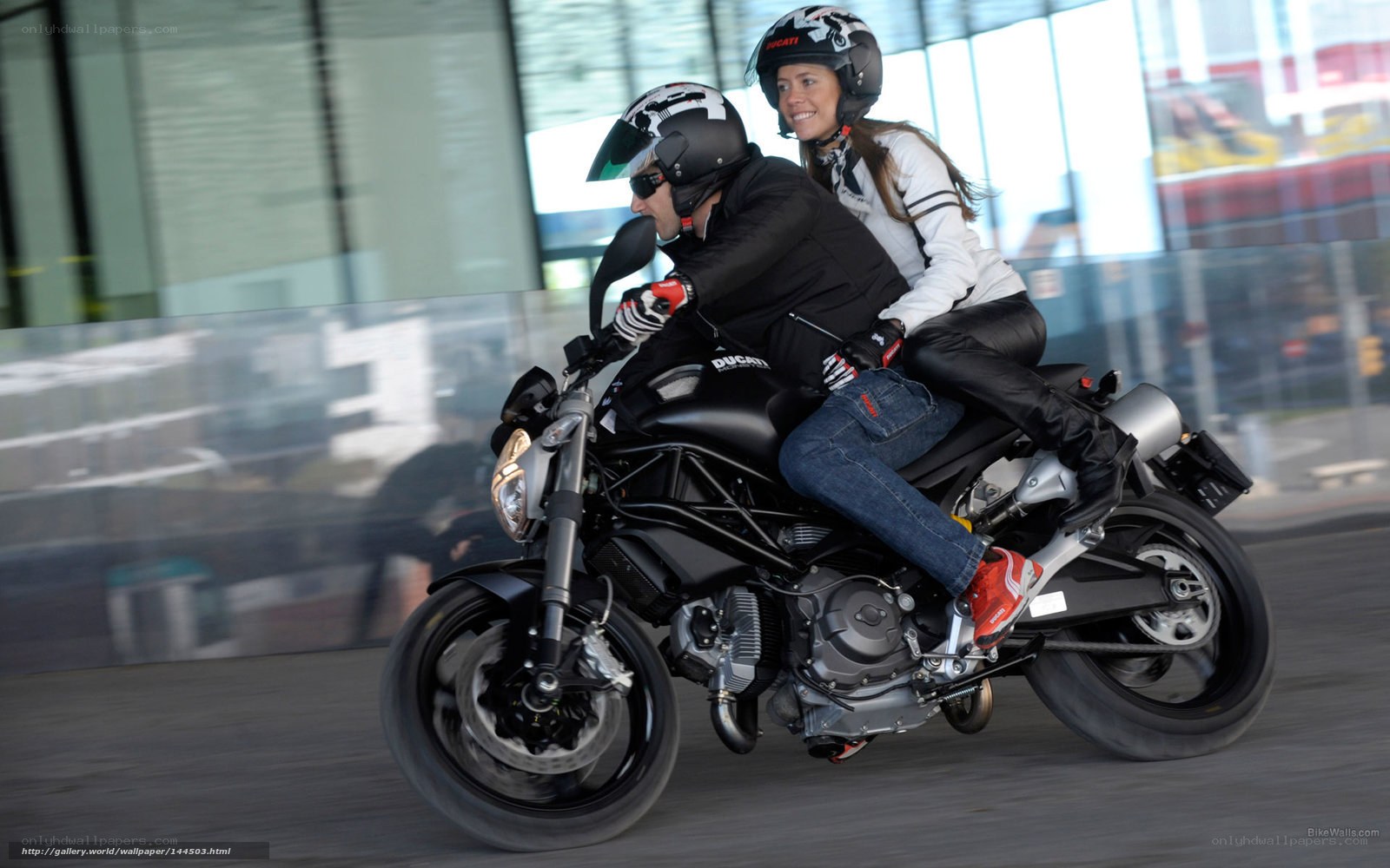 Couple riding a motorcycle