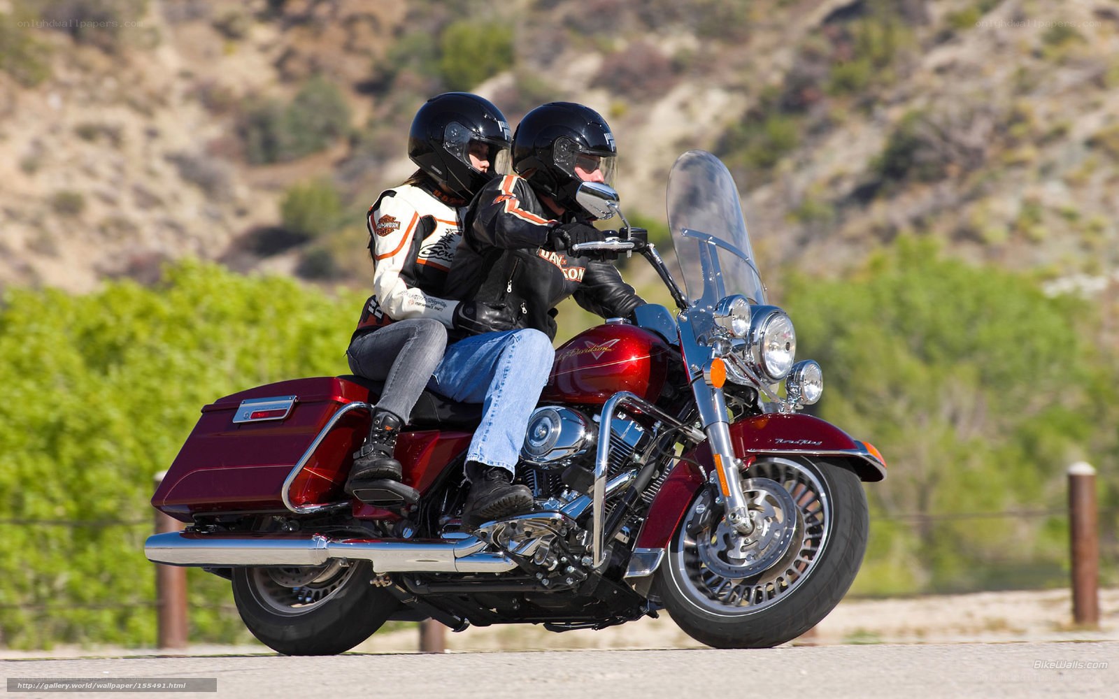 Couple riding a motorcycle