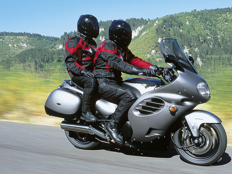 Couple riding a motorcycle
