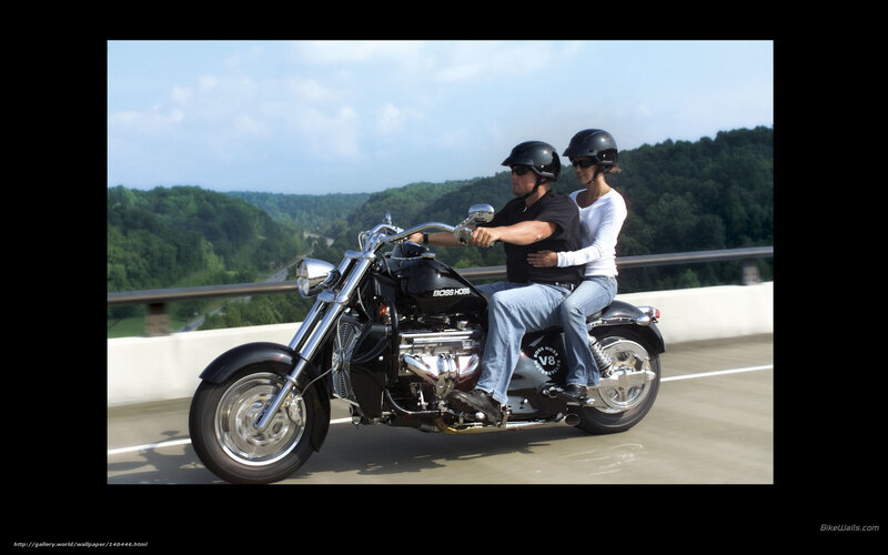 Couple riding a motorcycle