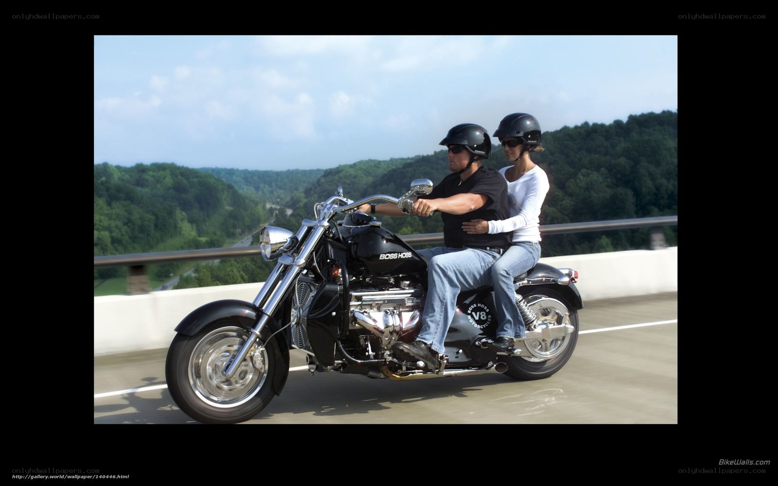 Couple riding a motorcycle