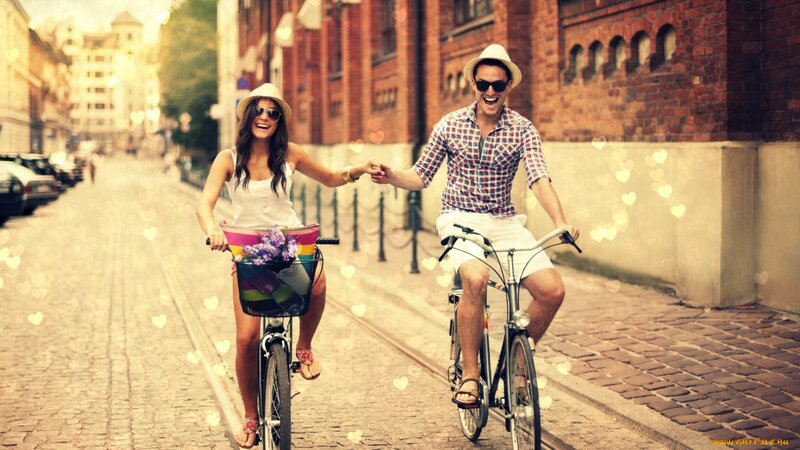 Couple Riding Bicycles — Brown
