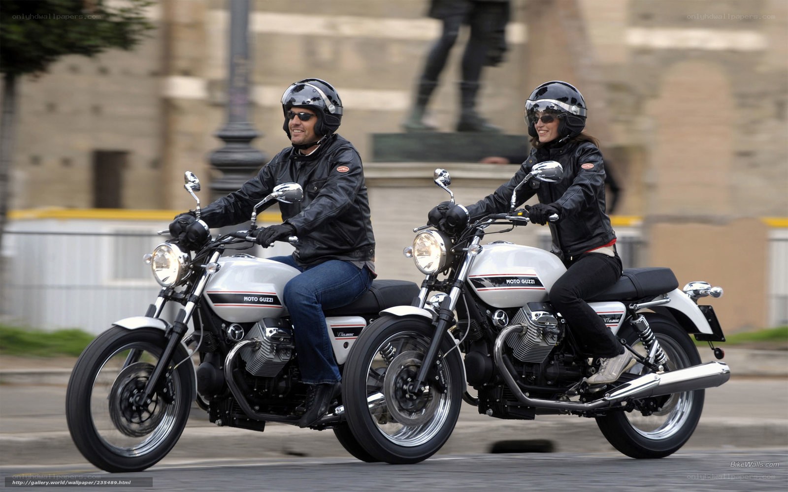 Couple riding Moto Guzzi motorcycles