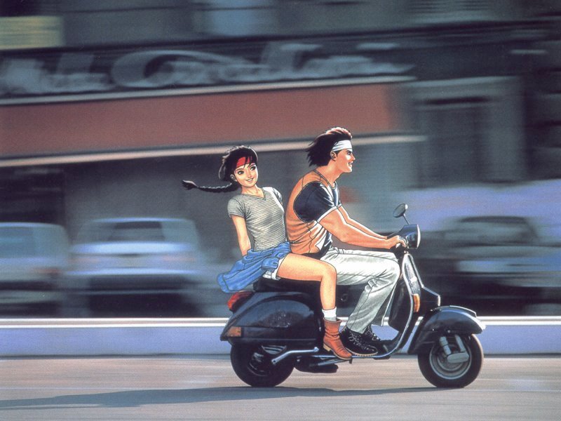 Couple riding scooter in city
