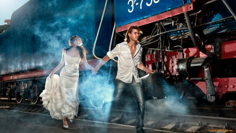 Couple Running from Train
