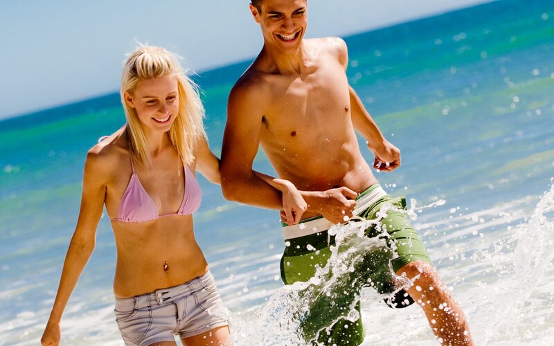 Couple Running in Ocean