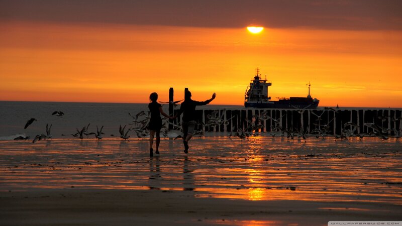 Couple Running on Beach — Orange