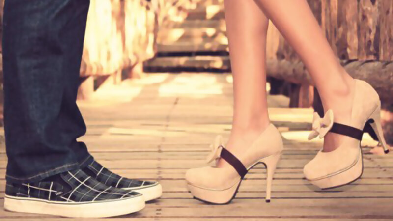 Couple's Feet on Deck