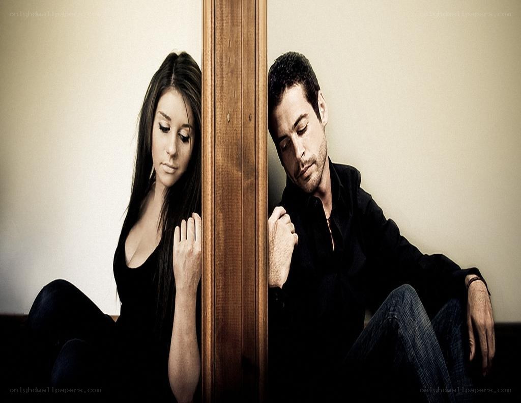 couple separated by a wall